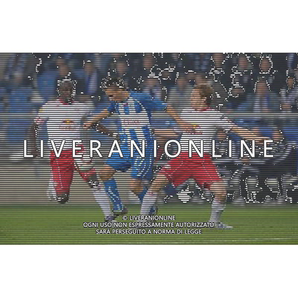 EUROPA LEAGUE 2010-2011- partita: LECH POZNAN FC RED BULL SALZBURG nella foto: RABIU AFOLABI, SLAWOMIR PESZKO , CHRISTIAN SCHWEGLER © JAKUB KACZMARCZYK/PRESSFOCUS/ NEWSPIX.PL - AG. ALDO LIVERANI SAS ITALY ONLY *** Local Caption *** 