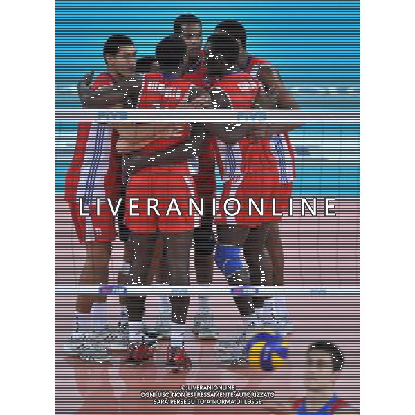 (101010) -- ROME, Oct. 10, 2010 () -- Cuba\'s players celebrate a score during the semi-final against Serbia at the 2010 FIVB Men\'s Volleyball World Championship in Rome, Italy, Oct. 9, 2010. Cuba won 3-2. (/Chen Haitong) ©photoshot/Agenzia Aldo Liverani Sas - ITALY ONLY - Cuba - Serbia Volley Campionati Mondiali Pallavolo maschile FIVB Semifinale Roma