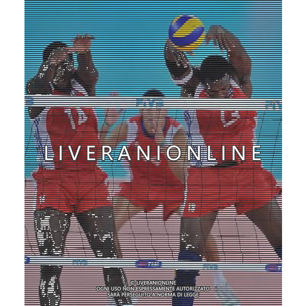 (101010) -- ROME, Oct. 10, 2010 () -- Cuba\'s Robertlandy Simon Aties (R) and Raydel Hierrezuelo Aguirre (L) block the ball during the semi-final against Serbia at the 2010 FIVB Men\'s Volleyball World Championship in Rome, Italy, Oct. 9, 2010. Cuba won 3-2. (/Chen Haitong) ©photoshot/Agenzia Aldo Liverani Sas - ITALY ONLY - Cuba - Serbia Volley Campionati Mondiali Pallavolo maschile FIVB Semifinale Roma