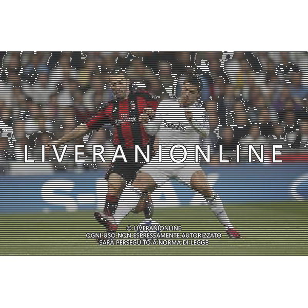 REAL MADRID - MILAN CHAMPIONS LEAGUE 19/10/2010 NELLA FOTO Cristiano Ronaldo e Gianluca Zambrotta Photo: Cesar Cebolla / ALFAQUI / AGENZIA ALDO LIVERANI SAS - ITALY ONLY - EDITORIAL USE ONLY