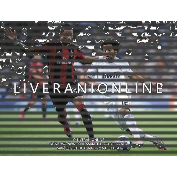 (101020) -- MADRID, Oct. 20, 2010 (Xinhua) -- Marcelo (R) of Real Madrid breaks through during the 2010/2011 UEFA Champions League Group G soccer match against AC Milan at Santiago Bernabeu stadium in Madrid, capital of Spain, Oct.19, 2010. Real Madrid won 2-0. (Xinhua/Chen Haitong) (xm) ©photoshot/Agenzia Aldo Liverani Sas - ITALY ONLY: Real Madrid - Milan UEFA Champions League 2010/2011 Gruppo G stadio Santiago Bernabeu a Madrid , capitale della Spagna, 19/10/2010. Real Madrid ha vinto 2-0.
