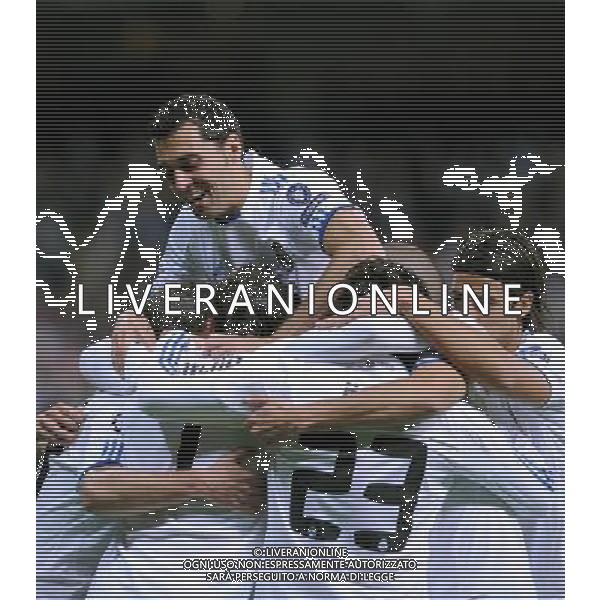 (101020) -- MADRID, Oct. 20, 2010 (Xinhua) -- Players of Real Madrid hug to celebrate the goal during their 2010/2011 UEFA Champions League Group G soccer match against AC Milan at Santiago Bernabeu stadium in Madrid, capital of Spain, Oct.19, 2010. Real Madrid won 2-0. (Xinhua/Chen Haitong) (xm) ©photoshot/Agenzia Aldo Liverani Sas - ITALY ONLY: Real Madrid - Milan UEFA Champions League 2010/2011 Gruppo G stadio Santiago Bernabeu a Madrid , capitale della Spagna, 19/10/2010. Real Madrid ha vinto 2-0.