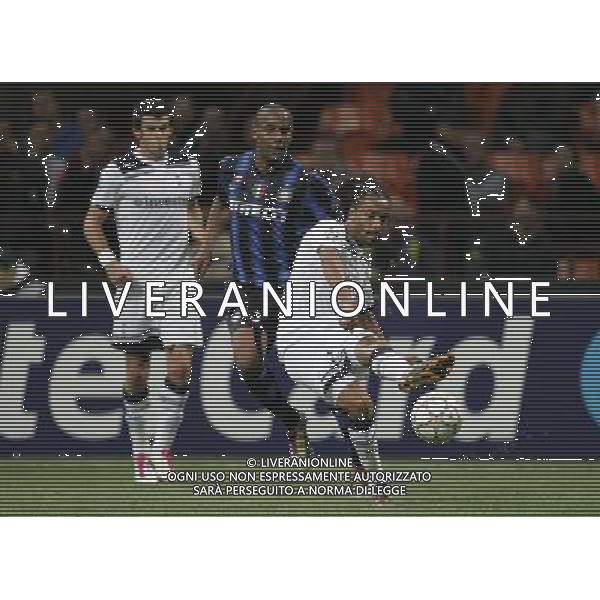 Milano 20-10-2010 Champions League 2010/11 inter-tottenham 4:3 nella foto benoit assou-ekotto e maicon ph marco luzzani/ag aldo liverani s.a.s.