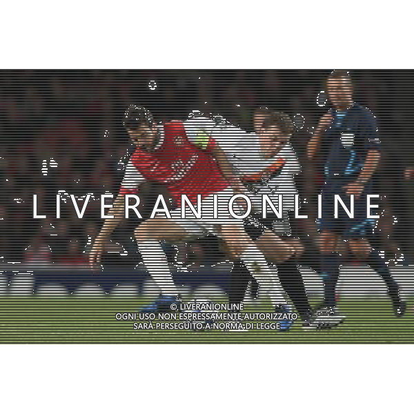 LONDRA CHAMPIONS LEAGUE 2010-2011: partita ARSENAL FC LONDON - SHAKHTAR DONETSK nella foto: CESC FABREGAS - OLEKSIJ HAJ © PIOTR KUCZA/NEWSPIX.PL - AG. ALDO LIVERANI SAS ITALY ONLY 