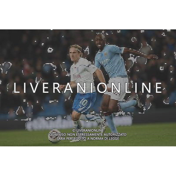 MANCHESTER 21.10.2010 UEFA EUROPA LEAGUE 2010-2011: MANCHESTER CITY FC - LECH POZNAN 3:1 nella foto: SERGIEJ KRIWIEC - PATRICK VIEIRA © PIOTR KUCZA / NEWSPIX.PL - AG. ALDO LIVERANI SAS ITALY ONLY 