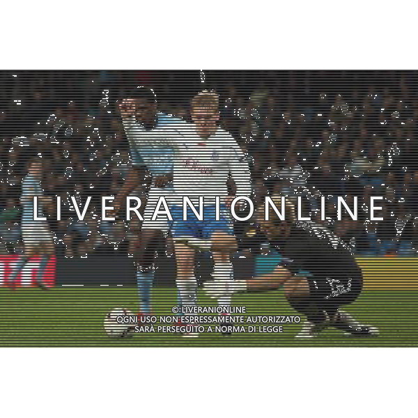 MANCHESTER 21.10.2010 UEFA EUROPA LEAGUE 2010-2011: MANCHESTER CITY FC - LECH POZNAN 3:1 nella foto: DEDRYCK BOYATA - ARTJOMS RUDNEVS - JOSEPH JOHN HART © PIOTR KUCZA / NEWSPIX.PL - AG. ALDO LIVERANI SAS ITALY ONLY 
