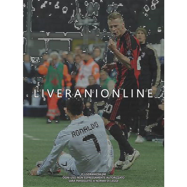 UEFA Champions League 2010/2011 Gruppo G Milano - 03.11.2010 Milan-Real Madrid Nella Foto:scontro cristiano ronaldo e ignazio abate /Ph.Vitez-Ag. Aldo Liverani