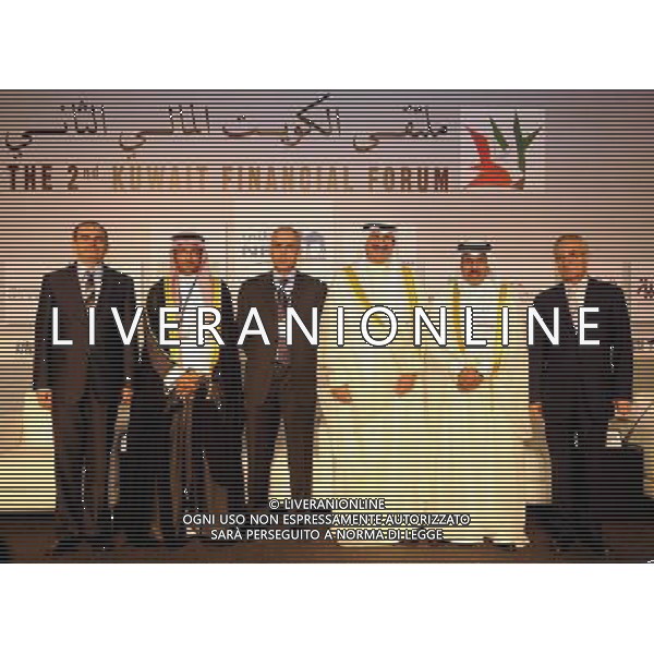 (101101) -- KUWAIT CITY, Nov. 1, 2010 -- (From L to R) Deputy Governor of the Central Bank of The Republic of Turkey Erdem Basci, Deputy Governor Saudi Arabian Monetary Abdul Rahman Al Khalaf, Governor of the Central Bank of Bahrain Racheed Al Maraj, Governor of Kuwait\'s Central Bank Sheikh Salem Abdulaziz al-Sabah, Governor of the Qatar Central Bank Sheikh Abdulla Saud AlThani, and Governor of the Central Bank of Jordon Dr. Umayya Salah Toukan pose for group photo at the start of the second Kuwait Financial Forum in Kuwait City Oct. 31, 2010. Noufal Ibarhim) (cl) ©photoshot/Agenzia Aldo Liverani Sas - ITALY ONLY - Secondo Forum Finanaziario a Kuwait City 31 ottobre, 2010.