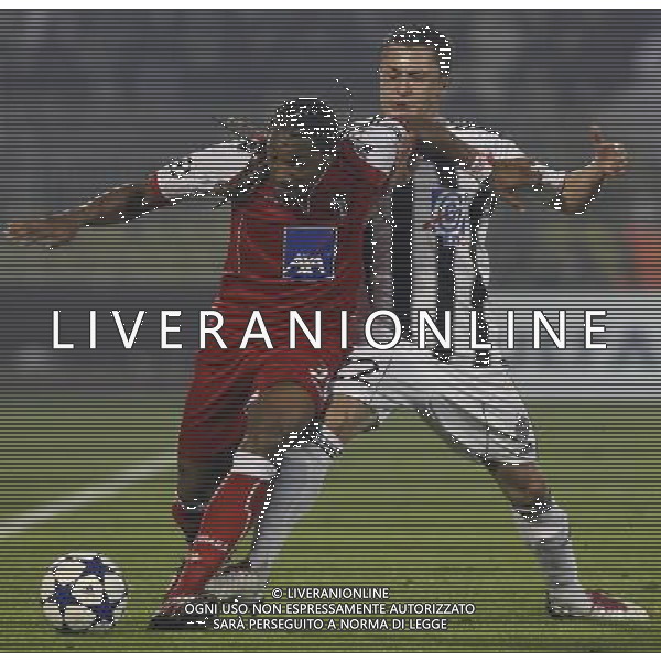 FC Braga player Alan, left is challenged by Partizan player Sasa Ilic, right, during their Group H UEFA Champions League match in Belgrade, Serbia, Wednesday, Nov. 3, 2010. © Srdjan Stevanovic/Starsportphoto.com - Newspix.pl - Ag. Aldo ITALY ONLY BELGRADO ( SERBIA) UEFA CHAMPIONS LEAGUE 2010-2011- partita FC PARTIZAN vs BRAGA *** Local Caption *** 