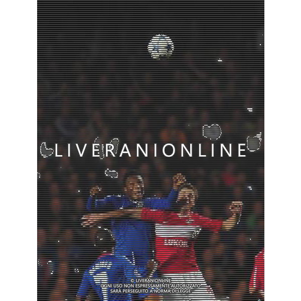 (101104) -- LONDON, Nov. 4, 2010 () -- John Obi Mikel (C) of Chelsea and Aleksandr Sheshukov (R) of Spartak Moskva compete for a header during the 2010-2011 UEFA Championships Group F match between Chelsea and Spartak Moskva in London, Britain, Nov. 3, 2010. Chelsea won by 4-1. (/Zeng Yi) - Xinhua/Photoshot - Ag. Aldo Liverani sas ITALY ONLY LONDRA - UEFA CHAMPIONS LEAGUE 2010-2011 partita CHELSEA vs SPARTAK MOSCA