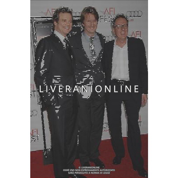Colin Firth, Tom Hooper and Geoffrey Rush Photo by Janet Gough \'The King\'s Speech\' Ensemble Tribute and Screening AFI FEST 2010 presented by Audi at Grauman\'s Chinese Theatre November 5, 2010 - Hollywood, California The King\'s Speech is a British historical drama film directed by Tom Hooper from a script by David Seidler. The film won the 2010 Toronto International Film Festival People\'s Choice Award. The film stars Colin Firth as King George VI and Geoffrey Rush as speech therapist Lionel Logue, who helped George VI overcome a stammer. ©photoshot/AGENZIA ALDO LIVERANI SAS - ITALY ONLY - *** Local Caption *** .