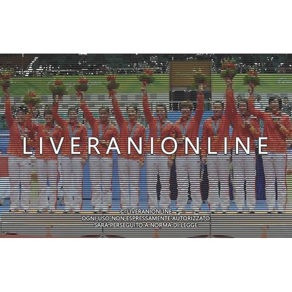 (101115) -- GUANGZHOU, Nov. 15, 2010 () -- £¬from L to R£©China\'s Yu Yang,Wang Xin,Jiang Yanjiao£ÂMa Jin£ÂWang Shixian£ÂTian Qing£ÂWang Xiaoli£ÂZhao Yunlei£ÂLu Lan and Cheng Shu gesture on the podium during the awarding ceremony of Women\'s Team of Badminton at the 16th Asian Games in Guangzhou, south China\'s Guangdong Province, on Nov. 15, 2010. China beat Thailand with 3-0 and got the gold medal. (/Lu Hanxin) ©photoshot/Agenzia Aldo Liverani Sas - ITALY ONLY - 16a Giochi Asiatici di Guangzhou, nel sud della Cina