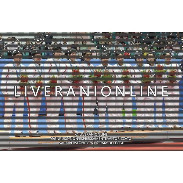 (101115) -- GUANGZHOU, Nov. 15, 2010 () -- Indonesia\'s bronze medalists pose for photos on the podium during the awarding ceremony of Women\'s Team of Badminton at the 16th Asian Games in Guangzhou, south China\'s Guangdong Province, on Nov. 15, 2010. (/Lu Hanxin) ©photoshot/Agenzia Aldo Liverani Sas - ITALY ONLY - 16a Giochi Asiatici di Guangzhou, nel sud della Cina