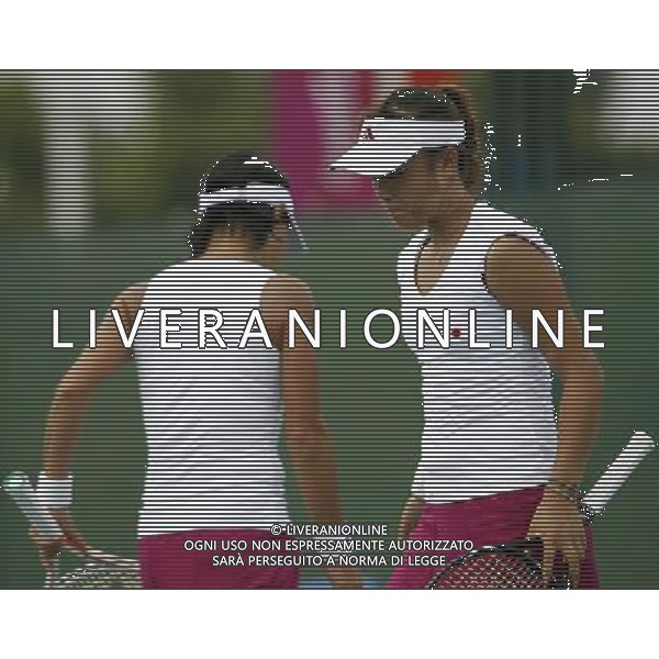 (101115) -- GUANGZHOU, Nov. 15, 2010 () --Japan\'s Morita Ayumi/Krumm Kimiko (R) react during the women\'s team semifinal of tennis against Chinese Taipei at the 16th Asian Games in Guangzhou, south China\'s Guangdong Province, Nov. 15, 2010. Japan lost the match by 1-2 and took the third place of the event. (/Ren Zhenglai) ©photoshot/Agenzia Aldo Liverani Sas - ITALY ONLY - 16a Giochi Asiatici di Guangzhou, nel sud della Cina