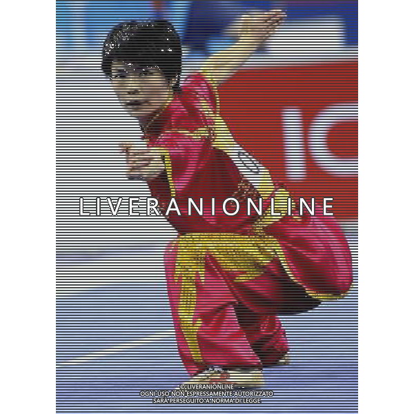 (101116) -- GUANGZHOU, Nov. 16, 2010 () --Geng Xiaoling of Hong Kong of China competes during the final of women\'s Changquan of Wushu event at the 16th Asian Games in Guangzhou, south China\'s Guangdong Province, Nov. 16, 2010. Geng won the gold medal with 9.75 points. (/Gesang Dawa)(rzl) ©photoshot/Agenzia Aldo Liverani Sas - ITALY ONLY - 16a Giochi Asiatici di Guangzhou, nel sud della Cina