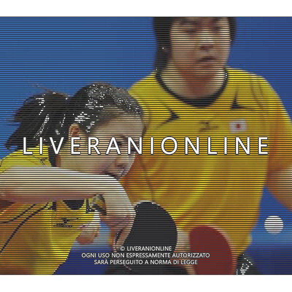 (101116) -- GUANGZHOU, Nov. 16, 2010 () -- Japan\'s Kishikawa Seiya/Fukuhara Ai (L) compete during their mixed doubles 1/8 final of table tennis against India\'s Sharath Achanta/Shamini at the 16th Asian Games held in Guangzhou, capital of south China\'s Guangdong Province, Nov. 16, 2010. The Japanese pair won by 3-2. (/Xu Jiajun) ©photoshot/Agenzia Aldo Liverani Sas - ITALY ONLY - 16a Giochi Asiatici di Guangzhou, nel sud della Cina