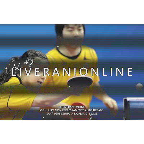 (101116) -- GUANGZHOU, Nov. 16, 2010 () -- Japan\'s Kishikawa Seiya/Fukuhara Ai (L) compete during their mixed doubles 1/8 final of table tennis against India\'s Sharath Achanta/Shamini at the 16th Asian Games held in Guangzhou, capital of south China\'s Guangdong Province, Nov. 16, 2010. The Japanese pair won by 3-2. (/Xu Jiajun) ©photoshot/Agenzia Aldo Liverani Sas - ITALY ONLY - 16a Giochi Asiatici di Guangzhou, nel sud della Cina