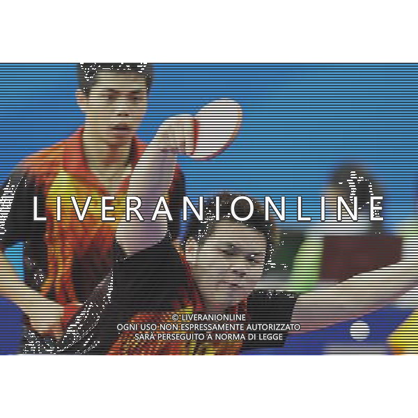 (101116) -- GUANGZHOU, Nov. 16, 2010 () -- Chinese Taipei\'s Chuang Chih Yuan/Wu Chih Chi (R) compete during the men\'s doubles 1/16 final of table tennis against Japan\'s Kishikawa Seiya/Mizutani Jun at the 16th Asian Games held in Guangzhou, capital of south China\'s Guangdong Province, Nov. 16, 2010. The pair of Chinese Taipei won by 3-2. (/Xu Jiajun) ©photoshot/Agenzia Aldo Liverani Sas - ITALY ONLY - 16a Giochi Asiatici di Guangzhou, nel sud della Cina