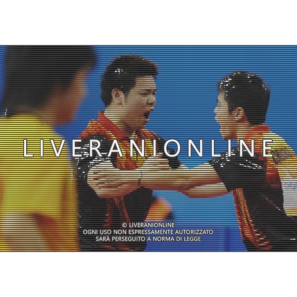 (101116) -- GUANGZHOU, Nov. 16, 2010 () -- Chuang Chih Yuan(R)/Wu Chih Chi of Chinese Taipei celebrate during the men\'s doubles 1/16 final of table tennis against Japan\'s Kishikawa Seiya/Mizutani Jun at the 16th Asian Games held in Guangzhou, capital of south China\'s Guangdong Province, Nov. 16, 2010. The pair of Chinese Taipei won by 3-2. (/Xu Jiajun) ©photoshot/Agenzia Aldo Liverani Sas - ITALY ONLY - 16a Giochi Asiatici di Guangzhou, nel sud della Cina