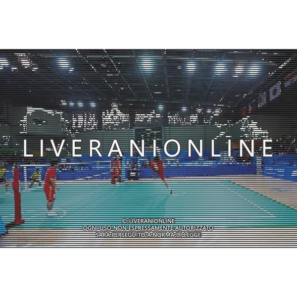(101116) -- GUANGZHOU, Nov. 16, 2010 () -- Ding Yuting(1st,R) of China kicks the ball during the men\'s team preliminary match group B of the Sepaktakraw event against the team of Malaysia at the 16th Asian Games held in Guangzhou, capital of south China\'s Guangdong Province, Nov. 16, 2010. The team of China lost by 1-2. (/Li Ming) (sss) ©photoshot/Agenzia Aldo Liverani Sas - ITALY ONLY - 16a Giochi Asiatici di Guangzhou, nel sud della Cina