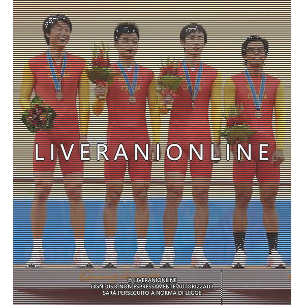 (101116) -- GUANGZHOU, Nov. 16, 2010 () -- Team China pose on the podium during the awarding ceremony for the men\'s cycling Team Pursuit Race finals at the 16th Asian Games in Guangzhou, south China\'s Guangdong Province, Nov. 16, 2010. China took the bronze. (/Li Ga) ©photoshot/Agenzia Aldo Liverani Sas - ITALY ONLY - 16a Giochi Asiatici di Guangzhou, nel sud della Cina