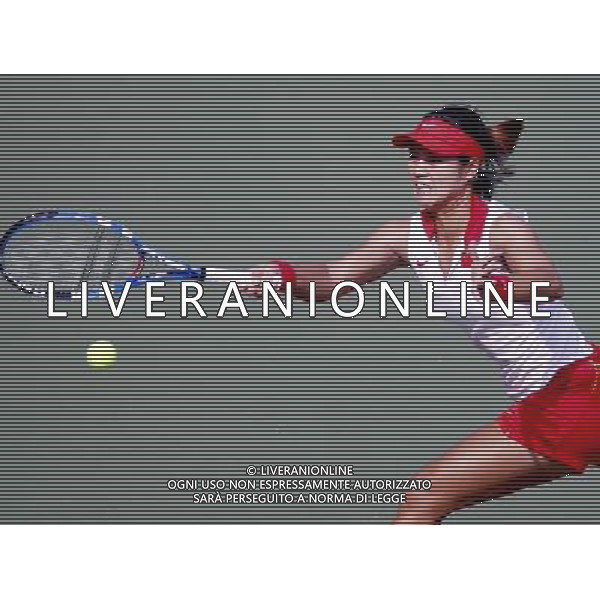 (101116) -- GUANGZHOU, Nov. 16, 2010 () --Li Na of China returns the ball against Chang Yung Jan of Chinese Taipei during the women\'s team final of tennis at the 16th Asian Games in Guangzhou, south China\'s Guangdong Province, Nov. 16, 2010. China won the gold medal, the second time at the Asian Games since 1986.(/Chen Jianli)(rzl) ©photoshot/Agenzia Aldo Liverani Sas - ITALY ONLY - 16a Giochi Asiatici di Guangzhou, nel sud della Cina