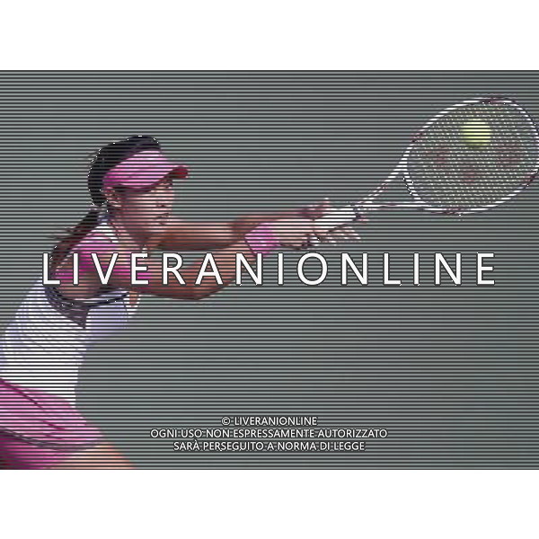 (101116) -- GUANGZHOU, Nov. 16, 2010 () --Chang Yung Jan of Chinese Taipei returns the ball against Li Na of China during the final of women\'tennis team competition at the 16th Asian Games in Guangzhou, south China\'s Guangdong Province, Nov. 16, 2010. Chinese Taipei lost the match with 1-2 and won the silver medal.(/Chen Jianli)(rzl) ©photoshot/Agenzia Aldo Liverani Sas - ITALY ONLY - 16a Giochi Asiatici di Guangzhou, nel sud della Cina