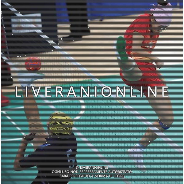(101117) -- GUANGZHOU, Nov. 17() -- Song Cheng (R) of China acts during a preliminary match of women\'s team sepaktakraw competition against India at the 16th Asian Games in Guangzhou, south China\'s Guangdong Province, Nov. 17, 2010. China won the match 3-0. (/Guo Yong) ©PHOTOSHOT /Agenzia Aldo Liverani Sas - ITALY ONLY - CINA: 16mi Giochi Asiatici di Guangzhou