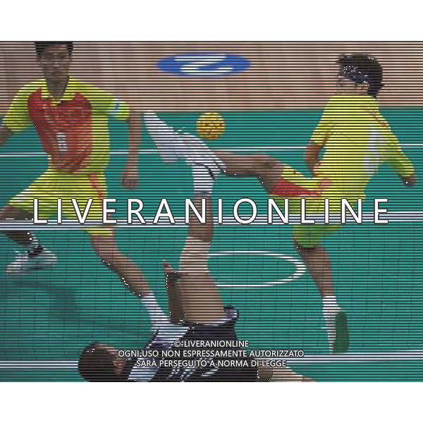 (101117) -- GUANGZHOU, Nov. 17() -- Xu Mingchi (R) of China kicks the ball during a preliminary match of men\'s team sepaktakraw competition against India at the 16th Asian Games in Guangzhou, south China\'s Guangdong Province, Nov. 17, 2010. China won the match 2-1. (/Guo Yong) ©PHOTOSHOT /Agenzia Aldo Liverani Sas - ITALY ONLY - CINA: 16mi Giochi Asiatici di Guangzhou