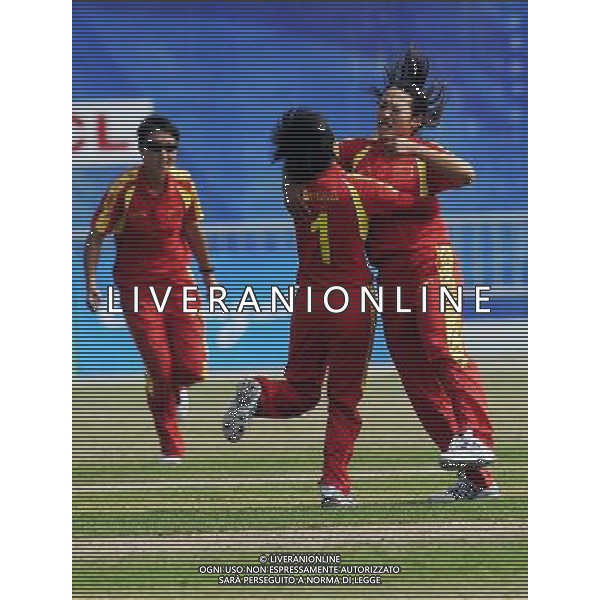 (101117) -- GUANGZHOU, Nov. 17 () -- Players of China celebrate during women\'s Group Pool A match of Cricket against Thailand at the 16th Asian Games in Guangzhou, south China\'s Guangdong Province, Nov. 17, 2010. China won the match 93-92. (/Wang Ye) ©PHOTOSHOT /Agenzia Aldo Liverani Sas - ITALY ONLY - CINA: 16mi Giochi Asiatici di Guangzhou