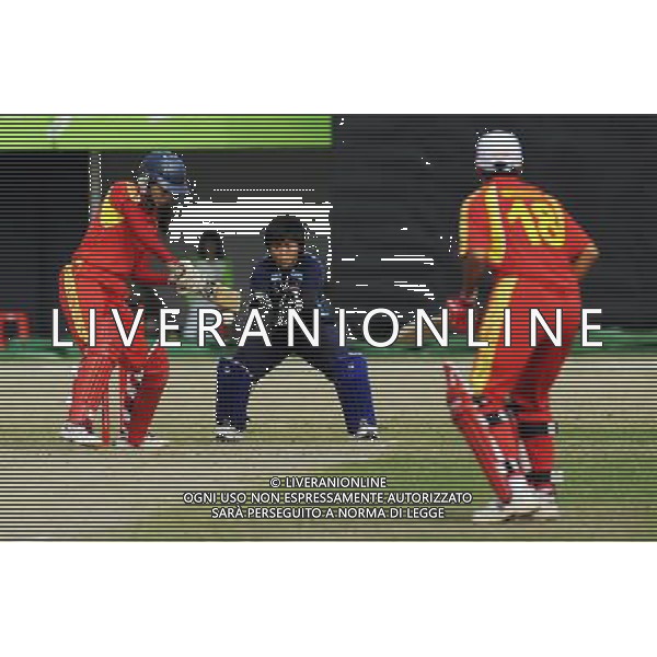 (101117) -- GUANGZHOU, Nov. 17 () -- Yu Miao (L) of China hits the ball during women\'s cricket Group Pool A match against Thailand at the 16th Asian Games in Guangzhou, south China\'s Guangdong Province, Nov. 17, 2010. China won the match 93-92. (/Wang Ye) ©PHOTOSHOT /Agenzia Aldo Liverani Sas - ITALY ONLY - CINA: 16mi Giochi Asiatici di Guangzhou