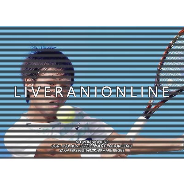 (101117) -- GUANGZHOU, Nov. 17, 2010 () -- Vietnam\'s Nguyen Hoang Thien returns the ball during the men\'s singles first round match of tennis against Mohammed Al Nabhani of Oman at the 16th Asian Games in Guangzhou, south China\'s Guangdong Province, Nov. 17, 2010. Nguyen Hoang Thien won 2-1. (/Chen Jianli) ©PHOTOSHOT /Agenzia Aldo Liverani Sas - ITALY ONLY - CINA: 16mi Giochi Asiatici di Guangzhou