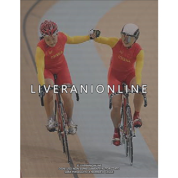 (101117) -- GUANGZHOU, Nov. 17() -- China\'s cyclists Guo Shuang (L) and Lin Junhong celebrate after women\'s sprint final of Cycling Track competition at the 16th Asian Games in Guangzhou, south China\'s Guangdong Province, Nov. 17, 2010. Guo won the gold medal and Lin won the silver. (/Li Ga) ©PHOTOSHOT /Agenzia Aldo Liverani Sas - ITALY ONLY - CINA: 16mi Giochi Asiatici di Guangzhou