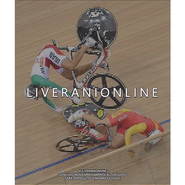 (101117) -- GUANGZHOU, Nov. 17 () -- Zhang Lei (bottom) of China and Mohammad Parash of Iran crash during the men\'s Keirin final of Cycling Track competition at the 16th Asian Games in Guangzhou, south China\'s Guangdong Province, Nov. 17, 2010. (/Li Ga) ©PHOTOSHOT /Agenzia Aldo Liverani Sas - ITALY ONLY - CINA: 16mi Giochi Asiatici di Guangzhou