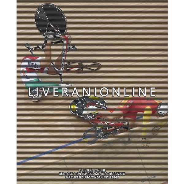 (101117) -- GUANGZHOU, Nov. 17 () -- Zhang Lei (R) of China and Mohammad Parash of Iran crash during the men\'s Keirin final of Cycling Track competition at the 16th Asian Games in Guangzhou, south China\'s Guangdong Province, Nov. 17, 2010. (/Li Ga) ©PHOTOSHOT /Agenzia Aldo Liverani Sas - ITALY ONLY - CINA: 16mi Giochi Asiatici di Guangzhou