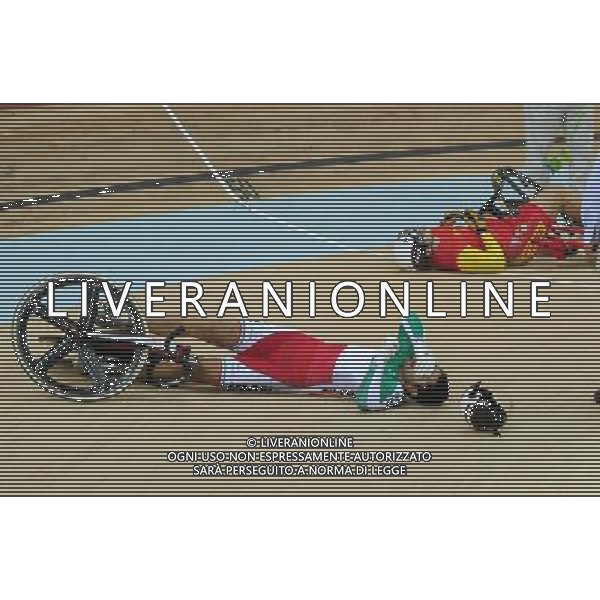 (101117) -- GUANGZHOU, Nov. 17 () -- Zhang Lei (R) of China and Mohammad Parash (L) of Iran crash during the men\'s Keirin final of Cycling Track competition at the 16th Asian Games in Guangzhou, south China\'s Guangdong Province, Nov. 17, 2010. (/Lu Hanxin) ©PHOTOSHOT /Agenzia Aldo Liverani Sas - ITALY ONLY - CINA: 16mi Giochi Asiatici di Guangzhou