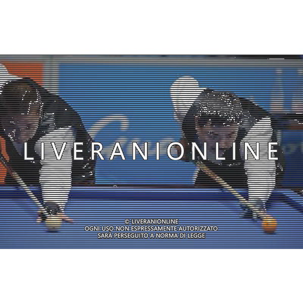 (101117) -- GUANGZHOU, Nov. 17, 2010 () -- Suzuki Tsuyoshi(L) and Kai Joji of Japan start the match together during the final of the men\'s carom 3 cushion singles category of Billiard Sports event at the 16th Asian Games in Guangzhou, capital of south China\'s Guangdong Province, Nov. 17, 2010. Suzuki Tsuyoshi of Japan beat his teammate Kai Joji 40-37 and claimed the title of the event. Kai Joji got the silver medal. (/Jiang Kehong)(sss) ©PHOTOSHOT /Agenzia Aldo Liverani Sas - ITALY ONLY - CINA: 16mi Giochi Asiatici di Guangzhou