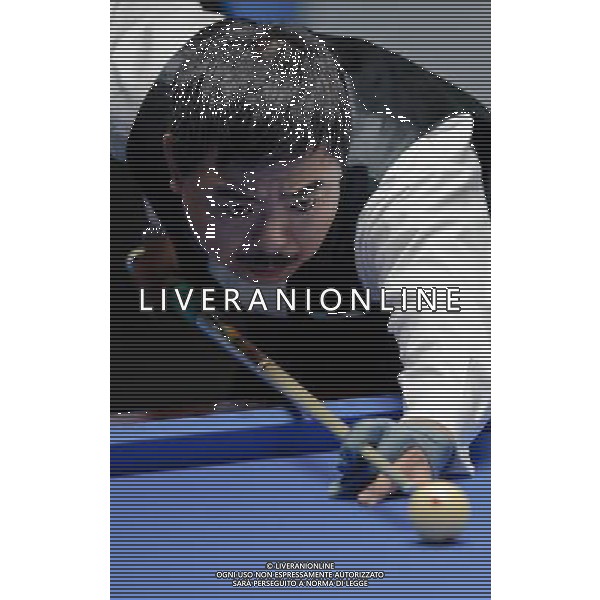 (101117) -- GUANGZHOU, Nov. 17, 2010 () -- Kai Joji of Japan competes during the final of the men\'s carom 3 cushion singles category of Billiard Sports event at the 16th Asian Games in Guangzhou, capital of south China\'s Guangdong Province, Nov. 17, 2010. Kai Joji of Japan lost to his teammate Suzuki Tsuyoshi by 37-40 and won the silver medal. (/Jiang Kehong)(sss) ©PHOTOSHOT /Agenzia Aldo Liverani Sas - ITALY ONLY - CINA: 16mi Giochi Asiatici di Guangzhou