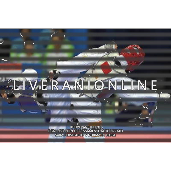 (101117) -- GUANGZHOU, Nov. 17, 2010 () -- Huang Hsien Yung(L) of Chinese Taipei competes with Sara Khosh Jamal Fekry of Iran during the women\'s under 46kg semifinal of taekwondo at the 16th Asian Games in Guangzhou, south China\'s Guangdong Province, Nov. 17, 2010. Huang Hsien Yung advanced to the final by beating Sara with 8-3. (/Song Zhenping)(wll) ©PHOTOSHOT /Agenzia Aldo Liverani Sas - ITALY ONLY - CINA: 16mi Giochi Asiatici di Guangzhou