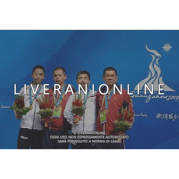 (101117) -- GUANGZHOU, Nov. 17, 2010 () -- Suzuki Tsuyoshi(1st,L) of Japan, Kai Joji(2nd,R) of Japan, Duong Anh Vu(2nd,L) of Vietnam and his teammate Ly The Vinh pose after the awarding ceremony for the men\'s carom 3 cushion singles category of Billiard Sports event at the 16th Asian Games in Guangzhou, capital of south China\'s Guangdong Province, Nov. 17, 2010. Suzuki Tsuyoshi of Japan won the gold medal and his teammate Kai Joji won the silver medal. Duong Anh Vu and Ly The Vinh of Vietnam got the bronze medals. (/Jiang Kehong)(sss) ©PHOTOSHOT /Agenzia Aldo Liverani Sas - ITALY ONLY - CINA: 16mi Giochi Asiatici di Guangzhou