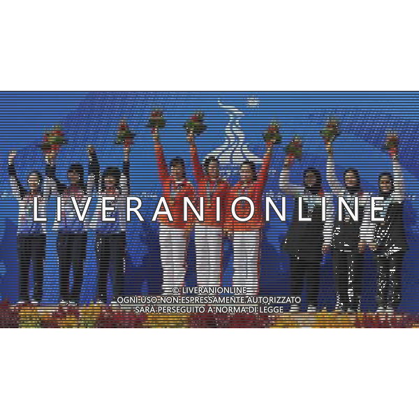 (101117) -- GUANGZHOU, Nov. 17() -- Gold medalist Team China (C), silver medalist Team South Korea (L) and bronze medalist Team Iran pose on the podium during the awarding ceremony for the women\'s 50m Rifle 3 Positions team at the 16th Asian Games in Guangzhou, south China\'s Guangdong Province, Nov. 17, 2010. China took the gold with 1733 points. (/Chen Yehua) ©PHOTOSHOT /Agenzia Aldo Liverani Sas - ITALY ONLY - CINA: 16mi Giochi Asiatici di Guangzhou