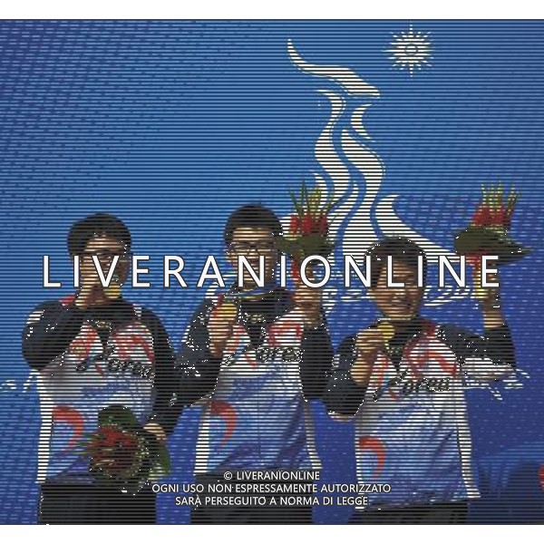 (101117) -- GUANGZHOU, Nov. 17() -- Team South Korea pose on the podium during the awarding ceremony for the men\'s 25m Standard Pistol team at the 16th Asian Games in Guangzhou, south China\'s Guangdong Province, Nov. 17, 2010. South Korea claimed the title with 1708 points. (/Chen Yehua) ©PHOTOSHOT /Agenzia Aldo Liverani Sas - ITALY ONLY - CINA: 16mi Giochi Asiatici di Guangzhou