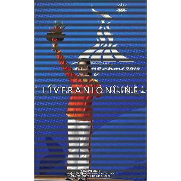(101117) -- GUANGZHOU, Nov. 17() -- Gold medalist Wang Chengyi of China poses on the podium during the awarding ceremony for the women\'s 50m Rifle 3 Positions at the 16th Asian Games in Guangzhou, south China\'s Guangdong Province, Nov. 17, 2010. (/Chen Yehua) ©PHOTOSHOT /Agenzia Aldo Liverani Sas - ITALY ONLY - CINA: 16mi Giochi Asiatici di Guangzhou