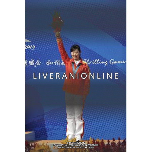 (101117) -- GUANGZHOU, Nov. 17() -- Bronze medalist Wu Liuxi of China poses on the podium during the awarding ceremony for the women\'s 50m Rifle 3 Positions at the 16th Asian Games in Guangzhou, south China\'s Guangdong Province, Nov. 17, 2010. (/Chen Yehua) ©PHOTOSHOT /Agenzia Aldo Liverani Sas - ITALY ONLY - CINA: 16mi Giochi Asiatici di Guangzhou