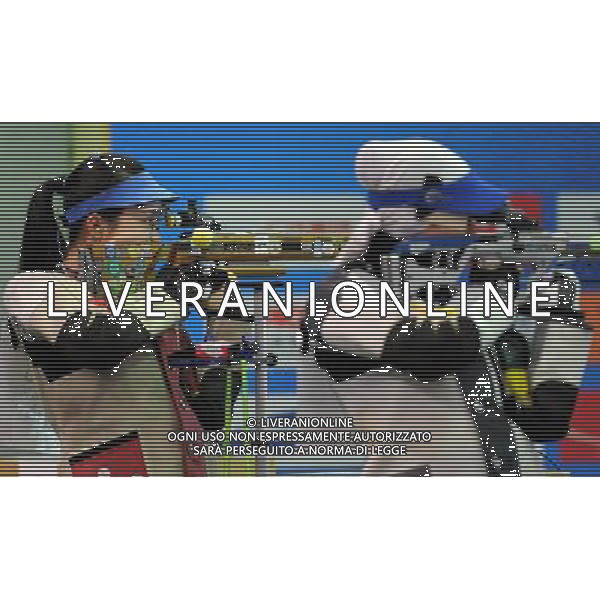 (101117) -- GUANGZHOU, Nov. 17() -- Gold medalist Wang Chengyi (L) of China competes during the women\'s 50m Rifle 3 Positions final at the 16th Asian Games in Guangzhou, south China\'s Guangdong Province, Nov. 17, 2010. (/Yan Yan) ©PHOTOSHOT /Agenzia Aldo Liverani Sas - ITALY ONLY - CINA: 16mi Giochi Asiatici di Guangzhou