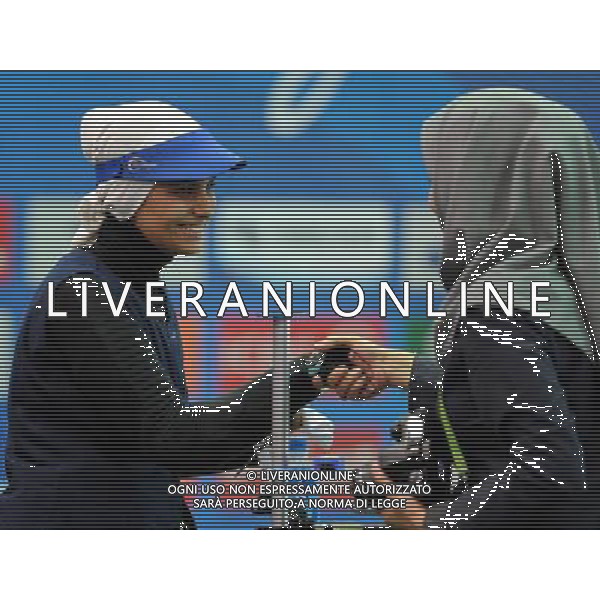 (101117) -- GUANGZHOU, Nov. 17() -- Silver medalist Elaheh Ahmadi (L) of Iran is congratulated after the women\'s 50m Rifle 3 Positions final at the 16th Asian Games in Guangzhou, south China\'s Guangdong Province, Nov. 17, 2010. (/Yan Yan) ©PHOTOSHOT /Agenzia Aldo Liverani Sas - ITALY ONLY - CINA: 16mi Giochi Asiatici di Guangzhou
