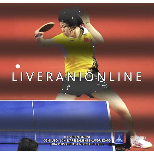(101118) -- GUANGZHOU, Nov. 18, 2010 (Xinhua) -- Li Xiaoxia of China returns the ball against Zulfiniso Saidalimova of Tajikistan during the 1/16 round of women\'s singles of table tennis at the 16th Asian Games in Guangzhou, south China\'s Guangdong Province, Nov. 18, 2010. Li won 4-0. (Xinhua/Xu Jiajun)(wll) ©PHOTOSHOT /Agenzia Aldo Liverani Sas - ITALY ONLY - CINA: 16mi Giochi Asiatici di Guangzhou
