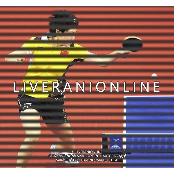(101118) -- GUANGZHOU, Nov. 18, 2010 (Xinhua) -- Guo Yue of China returns the ball against Thiphakone Southamavong of Lao PDR during the 1/16 round of women\'s singles of table tennis at the 16th Asian Games in Guangzhou, south China\'s Guangdong Province, Nov. 18, 2010. Guo Yue won 4-0. (Xinhua/Xu Jiajun)(wll) ©PHOTOSHOT /Agenzia Aldo Liverani Sas - ITALY ONLY - CINA: 16mi Giochi Asiatici di Guangzhou