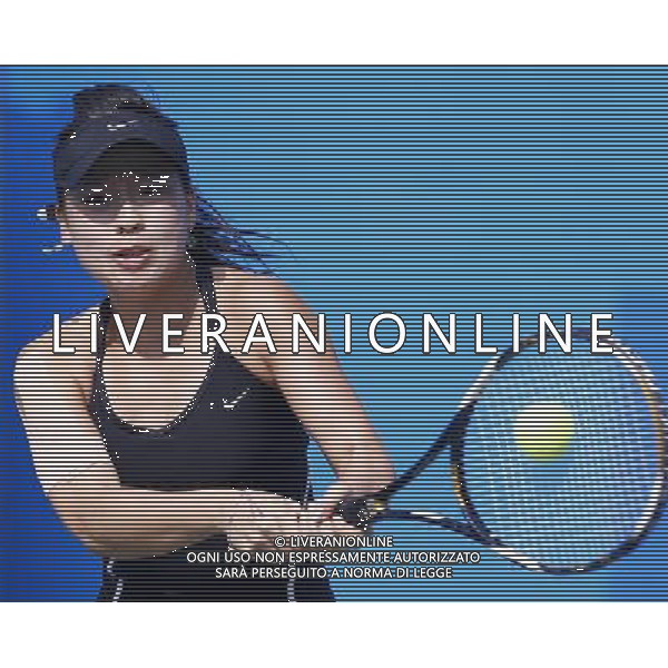 (101118) -- GUANGZHOU, Nov. 18(Xinhua) -- Chan Wing Yau Venise of Hong Kong of China returns the ball against Sania Mirza of India during the first round of Women\'s Singles of Tennis event at the 16th Asian Games in Guangzhou, south China\'s Guangdong Province, Nov. 18, 2010. Chan lost the match with 0-2. (Xinhua/Chen Jianli) ©PHOTOSHOT /Agenzia Aldo Liverani Sas - ITALY ONLY - CINA: 16mi Giochi Asiatici di Guangzhou