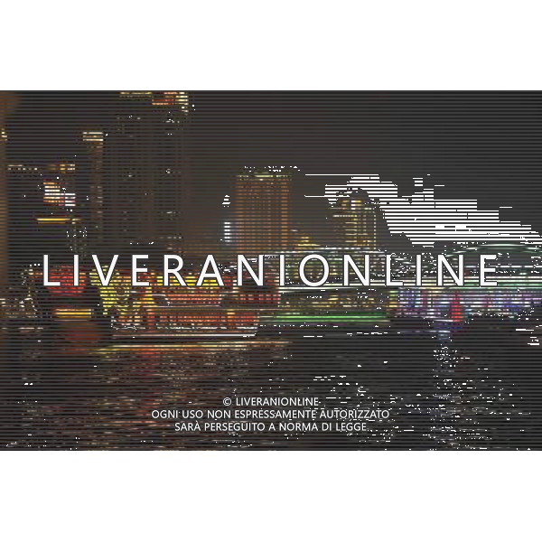 Ships carrying athletes and guests of the Asian Games sail past the Haizhu Bridge and head for opening ceremony on the Haixinsha Island in Guangzhou in south China\'s Guangdong province on Friday, Nov. 12, 2010.(Photo By Wang Dongming/ColorChinaPhoto) - AG. ALDO LIVERANI SAS ITALY ONLY CINA - GIOCHI ASIATICI DI GUANGZHOU 2010